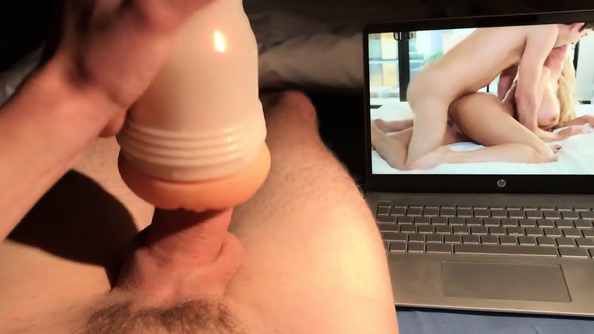 Masterbating cumming fleshlight while watching porn