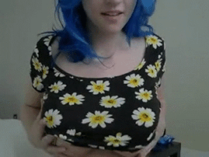 Blue haired babe playing with clit