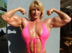 Female bodybuilder flexing vascular