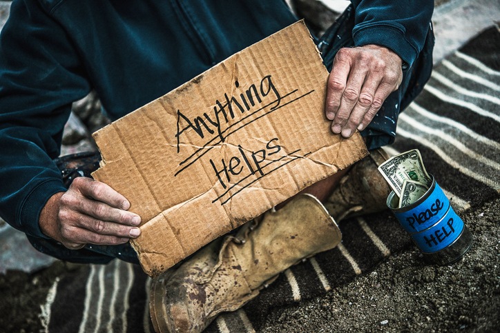 homeless threesome on street.